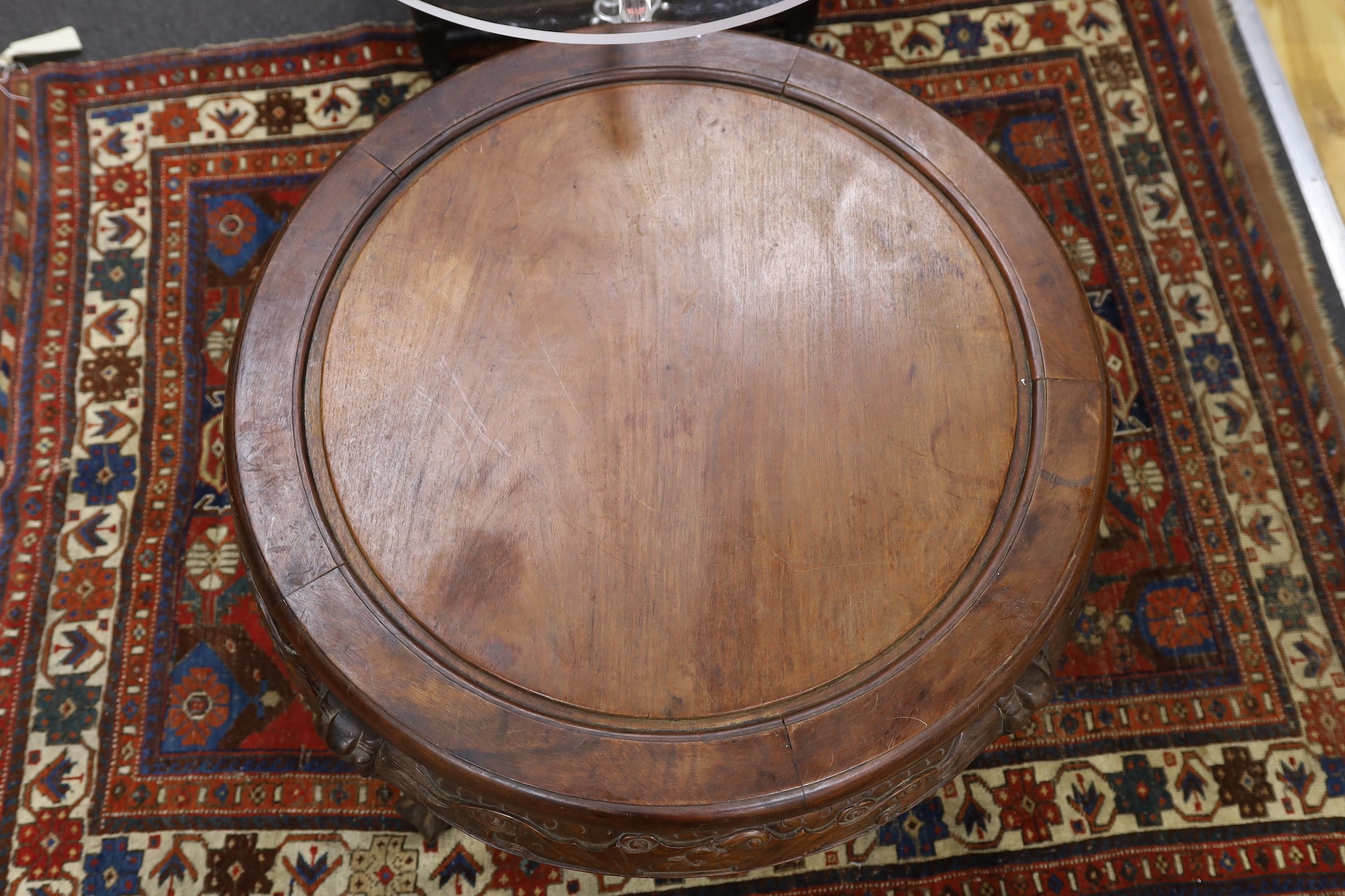 A Chinese hardwood circular table, diameter 75cm, height 54cm